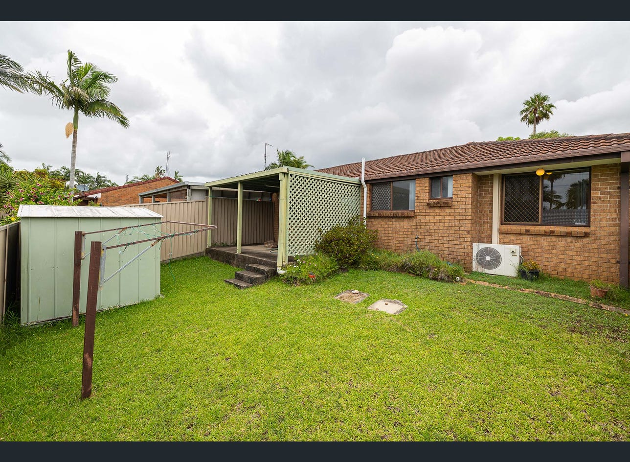 Before renovation: the original back yard and carport, Arundel